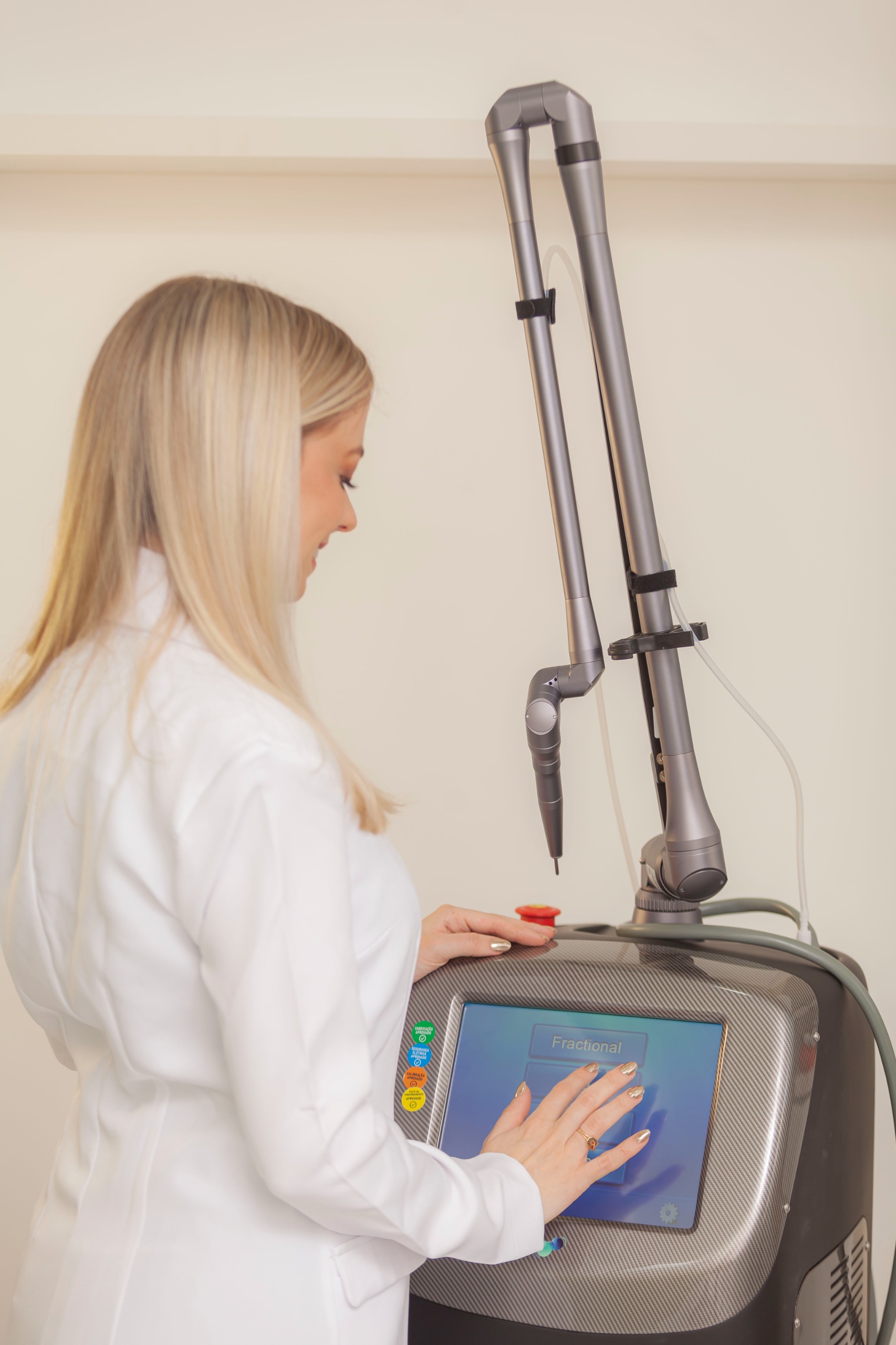 Dr. Melissa Amoroso operating the CO₂ laser